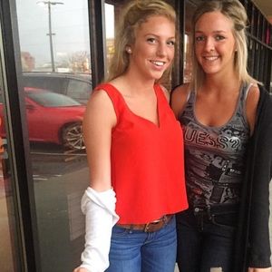 Red, open back shirt. Super cute perfect condition